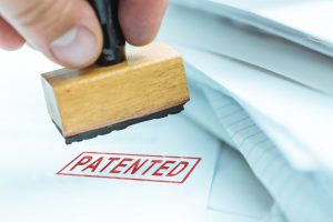 patented stamp on papers
